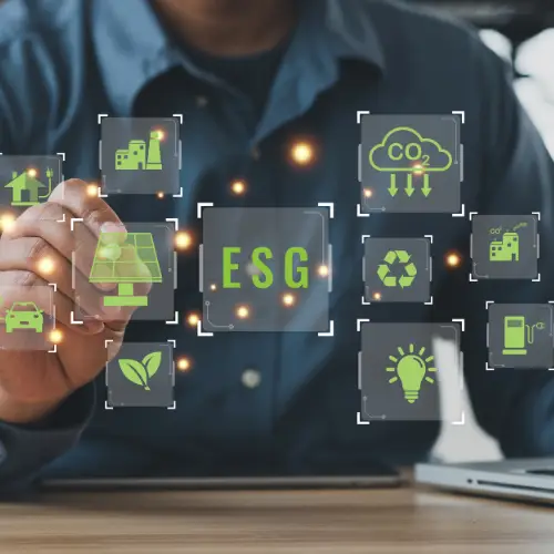 Person writing ESG solutions icons on a digital drawing board